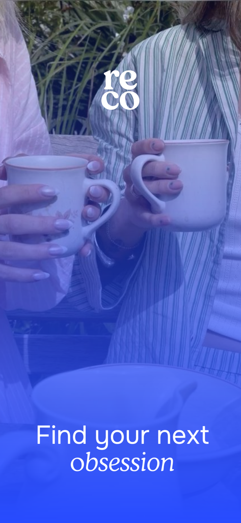 Two people holding coffee mugs with the Reco logo and the text Find your next obsession