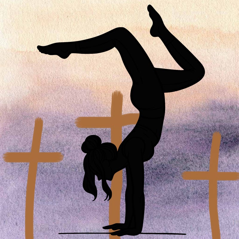 a woman doing a handstand