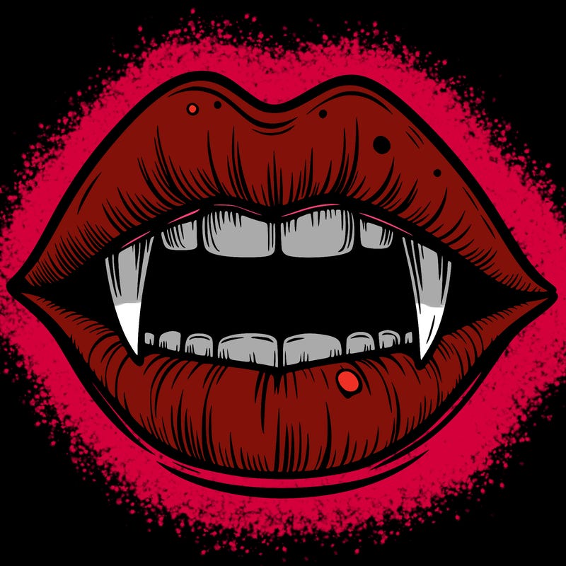 lips with vampire teeth