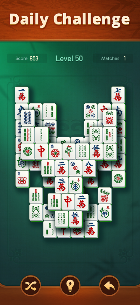 Écran du défi quotidien Vita Mahjong avec de grandes tuiles claires et un fond vert