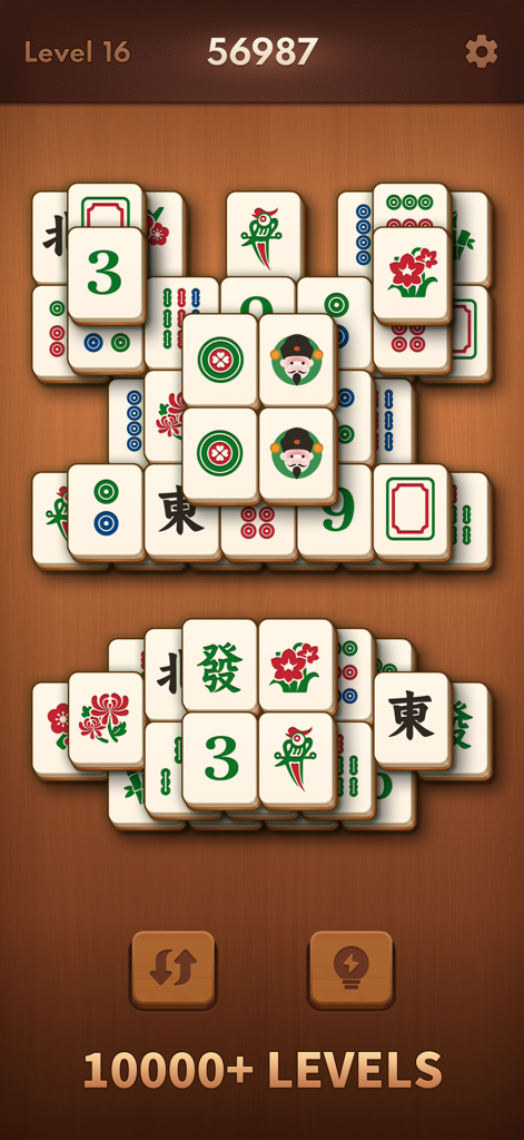 A screen from Mahjong Blast showing large tiles on a wooden background with a level counter.