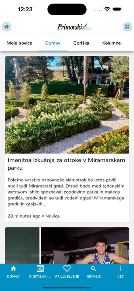 Primorski - L'interfaccia della schermata principale dell'app di notizie Primorski che mostra un articolo in primo piano sul Parco di Miramare in sloveno