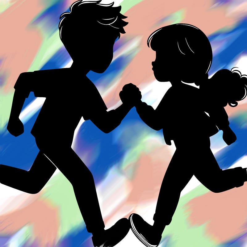 teen boy and girl running into eachother