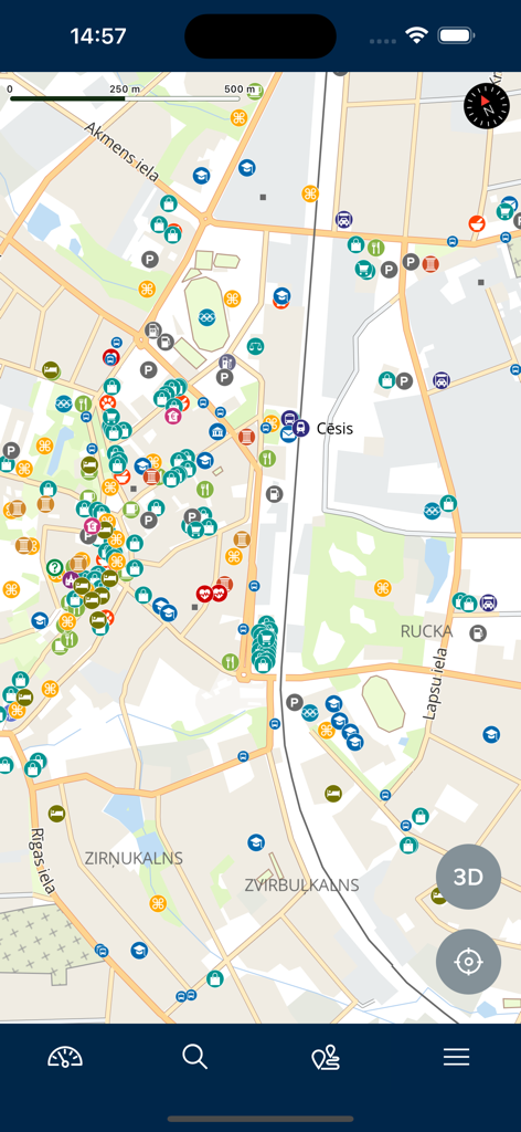 BalticMaps - A detailed street map of Cēsis with colorful icons representing various points of interest like shopping, dining, and landmarks.