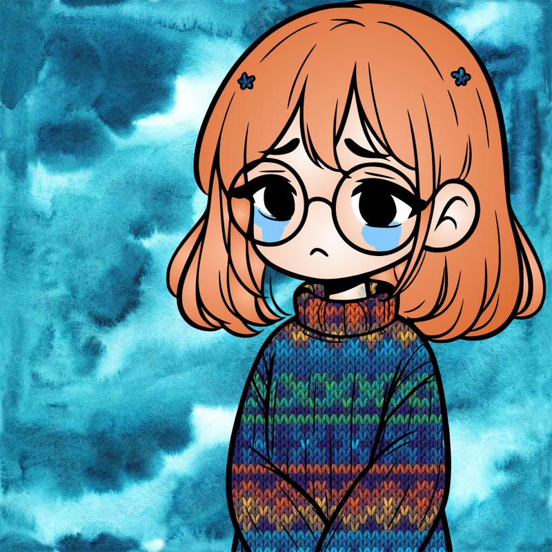 sad girl with glasses in a sweater