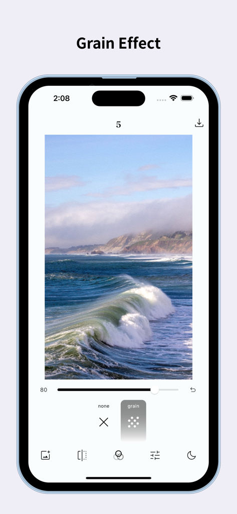 Interface de smartphone de l'application FilmN Lite Wave montrant l'outil de réglage de l'effet grain sur une photo panoramique d'une vague océanique