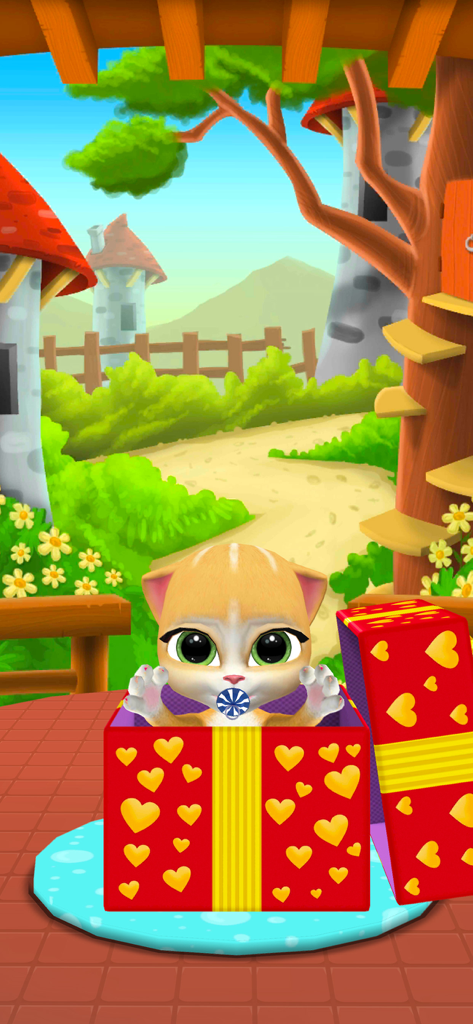 My Talking Cat Emma - La gatita canela Emma saliendo de una caja de regalo roja con corazones amarillos