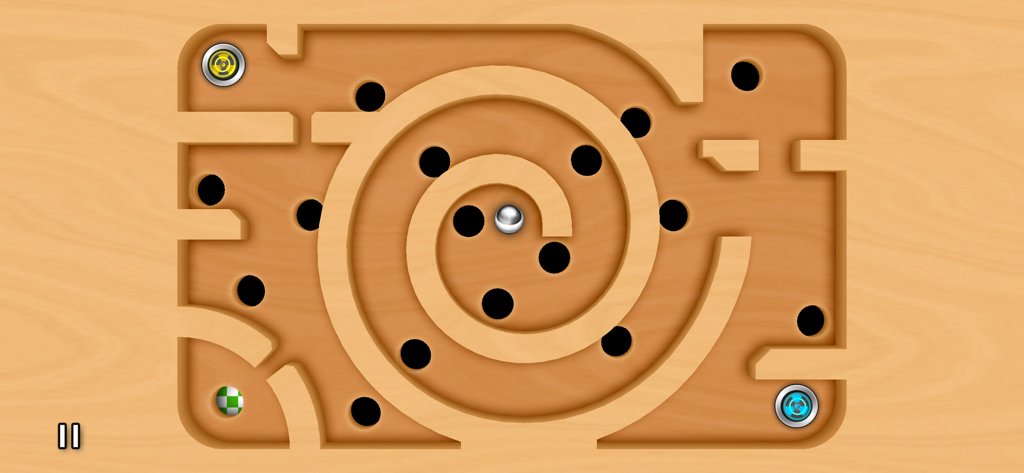 銀色のボールと丸いトラップのある木製の迷路盤