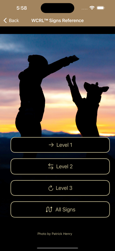WCRL® Rally Dog Obedience - WCRL Signs Reference screen showing buttons for Level 1 2 and 3 with a silhouette of a person training a dog at sunset