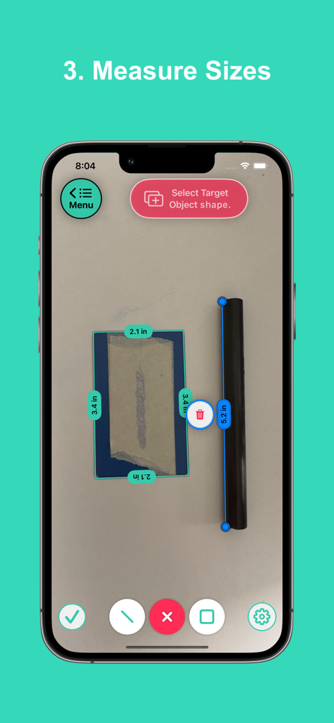 A screenshot of the VisualRuler 2.0 app interface showing digital measurements of a pen and a reference card on an iPhone screen.