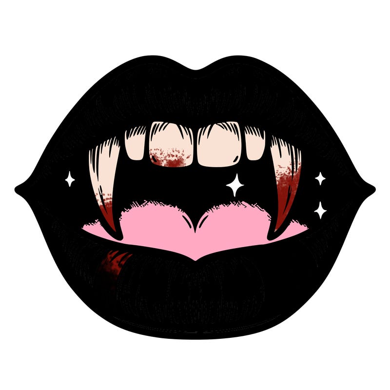 lips with vampire teeth