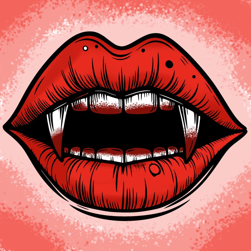 lips with vampire teeth