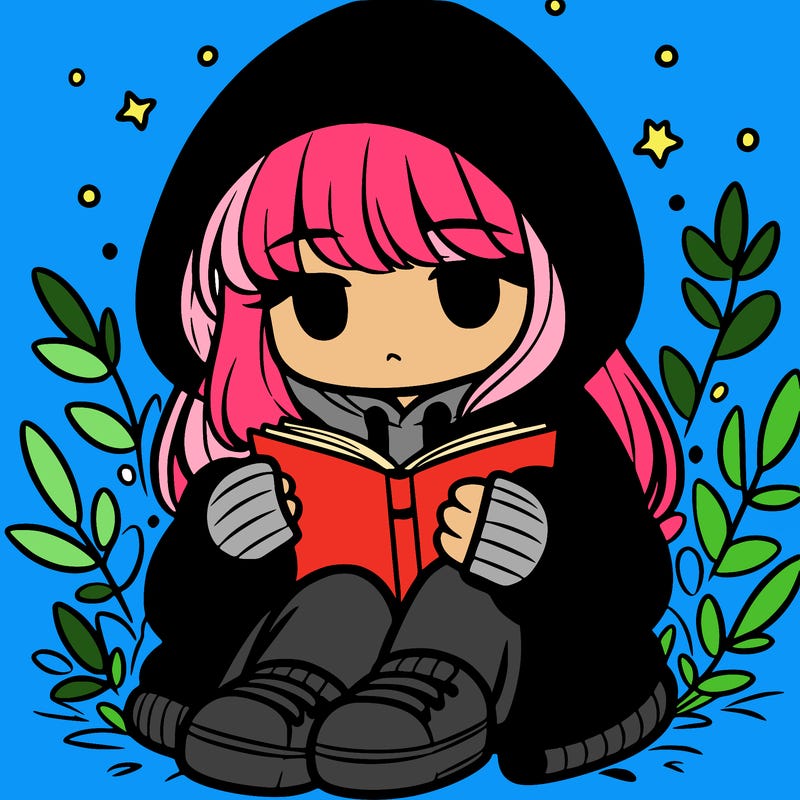 girl in oversized hoodie reading a book