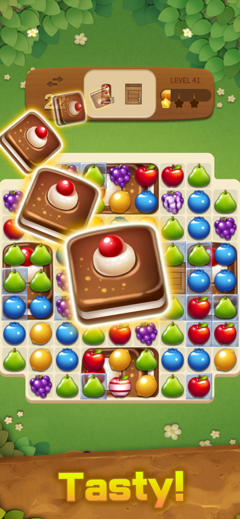 Fruits Magic : Match 3 Puzzle - Captura de pantalla de jugabilidad de Fruits Magic Match 3 Puzzle mostrando fichas de frutas y bonificaciones especiales de postre en un tablero temático de jardín.