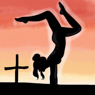 a woman doing a handstand
