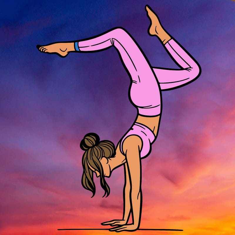 a woman doing a handstand