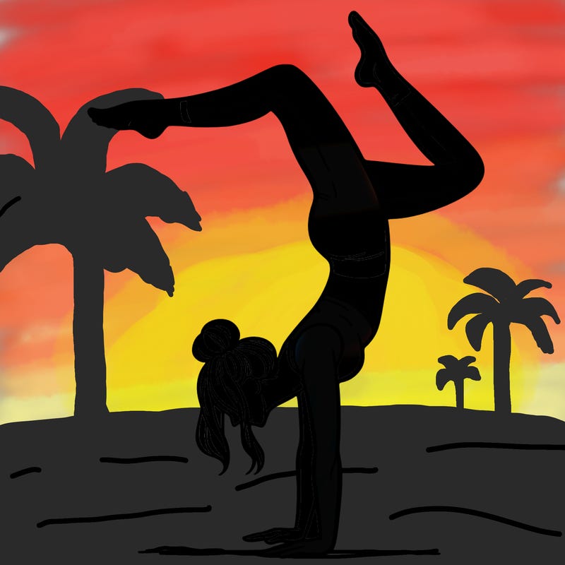 a woman doing a handstand