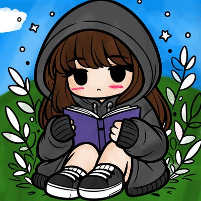 girl in oversized hoodie reading a book