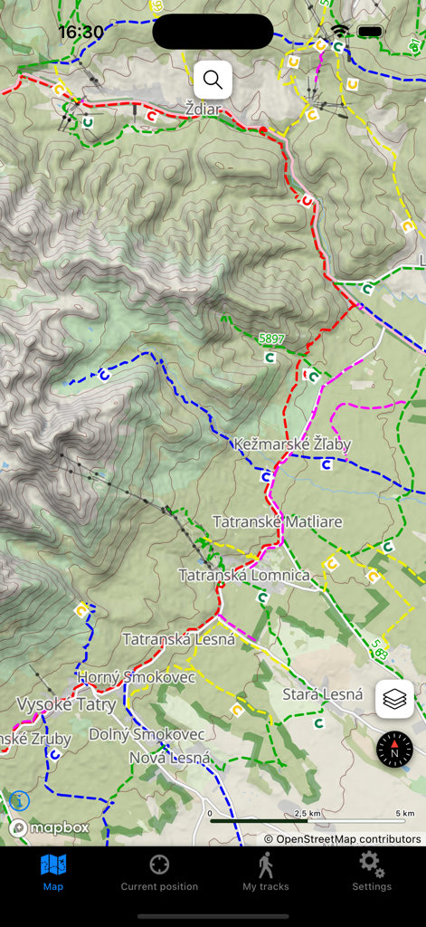 Detailed topographical map of Slovakia showing various hiking trails and mountain terrain in the app interface.