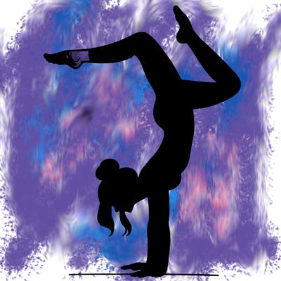 a woman doing a handstand