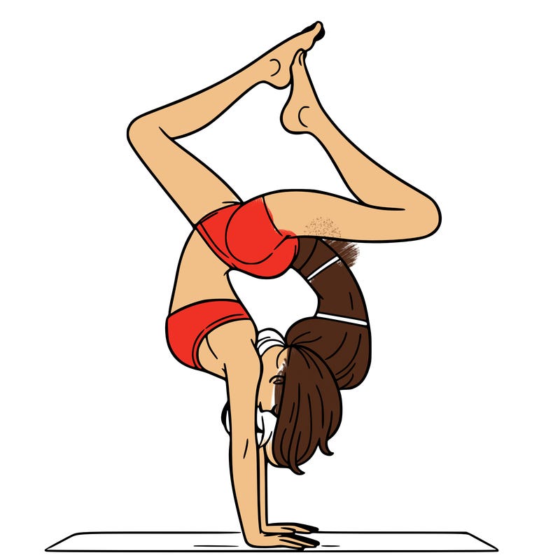 a woman doing a handstand