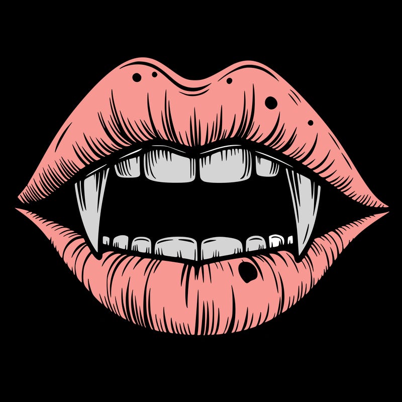 lips with vampire teeth