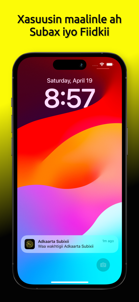 Quran Somali & Adkaar - iPhone lock screen showing a daily morning prayer reminder notification from the Quran Somali and Adkaar app.