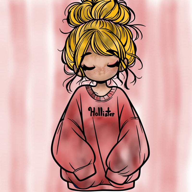 girl with baggy sweatshirt and messy bun