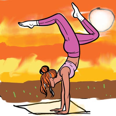 a woman doing a handstand