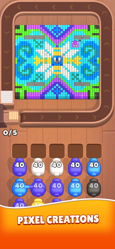 A pixel art pattern in the Color Blaze Shooter mobile game with character cannons below
