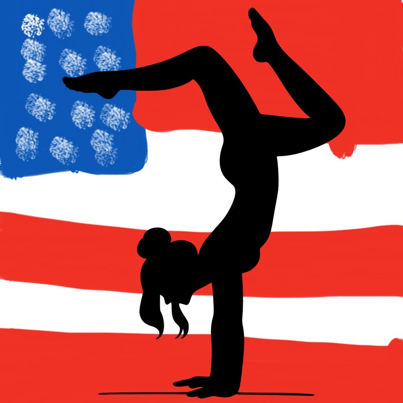 a woman doing a handstand