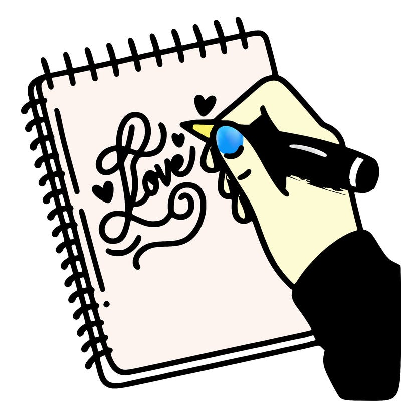 a hand writing “love” in calligraphy on a notebook