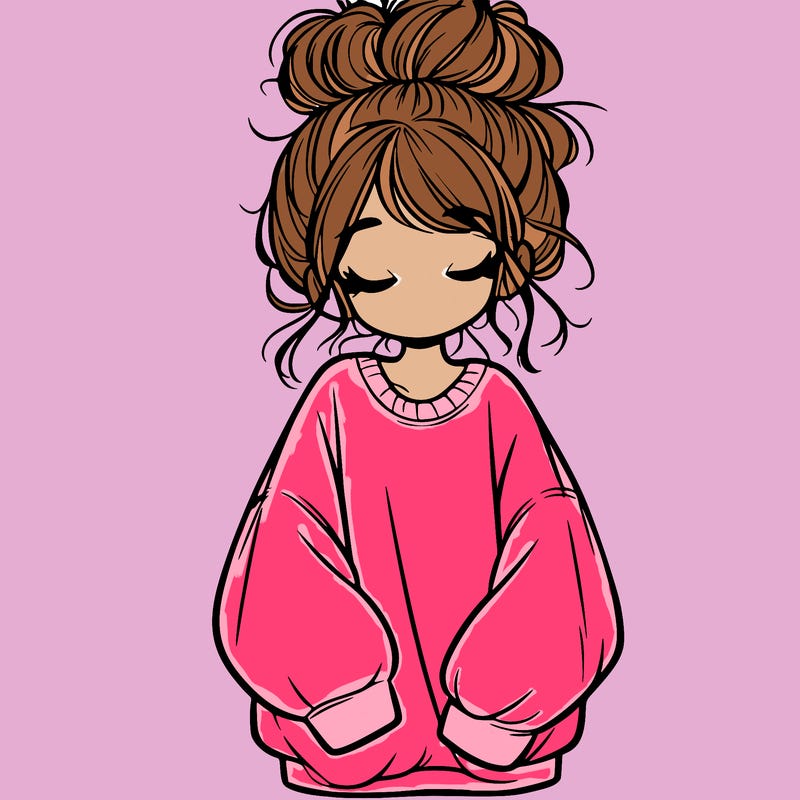 girl with baggy sweatshirt and messy bun