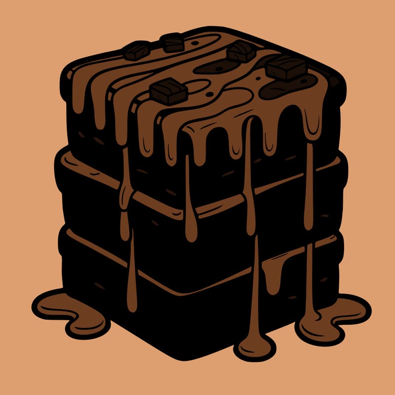 brownie fudge tower – a thick brownie cake drizzled with warm fudge sauce