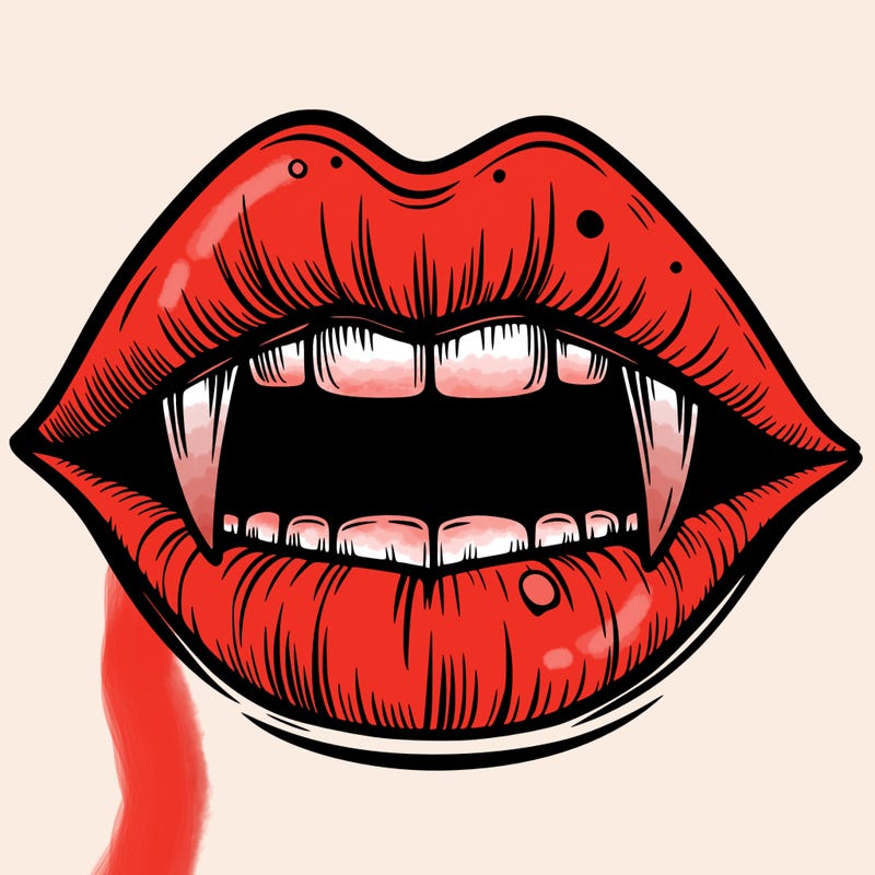 lips with vampire teeth