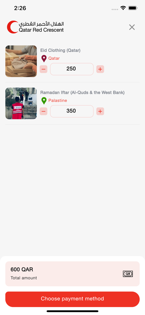 QRCS - Qatar Red Crescent app checkout screen showing a donation summary for Eid clothing and Ramadan meals