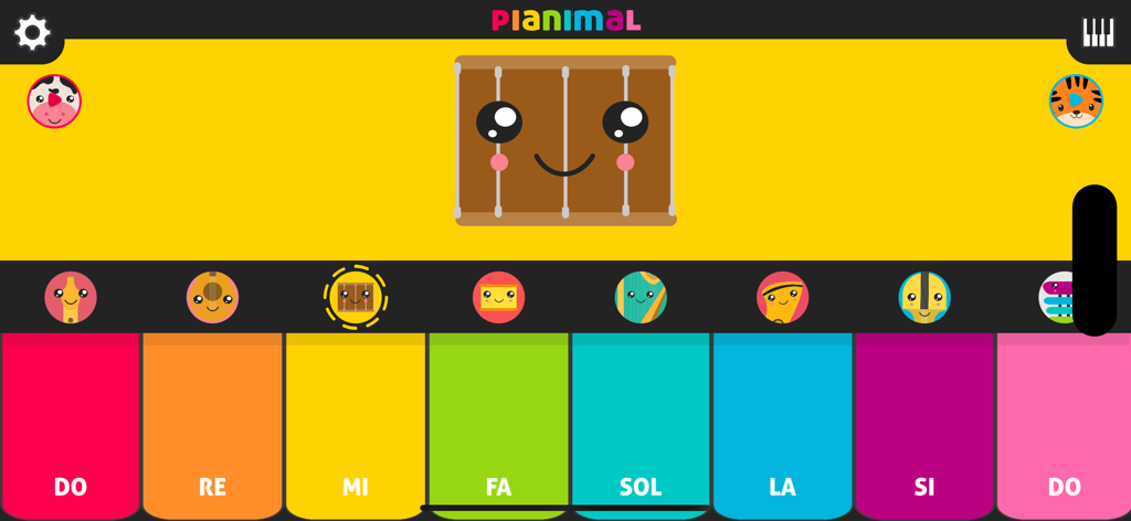 Un'interfaccia di pianoforte colorata per bambini con un simpatico personaggio tamburo e note musicali