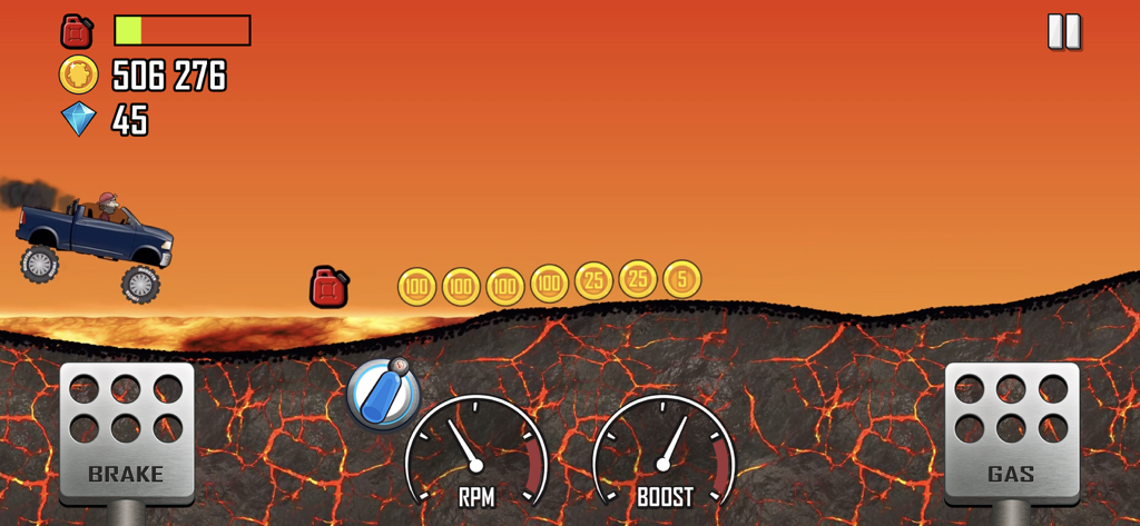Hill Climb Racing gameplay showing a monster truck on a volcanic lava stage
