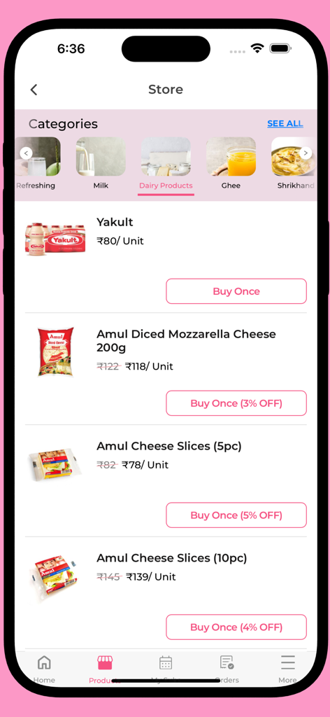 Milk 'n' More app store screen displaying dairy products like Yakult and Amul cheese with prices and buy once options.