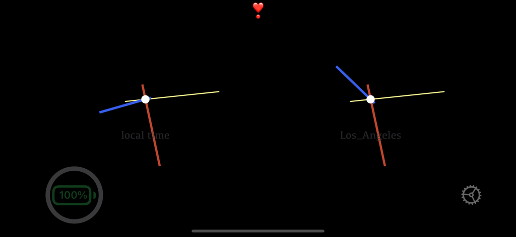 Always On Display - Interfaz de la aplicación Always On Display mostrando relojes analógicos dobles para zonas horarias locales y de Los Ángeles con un indicador de batería