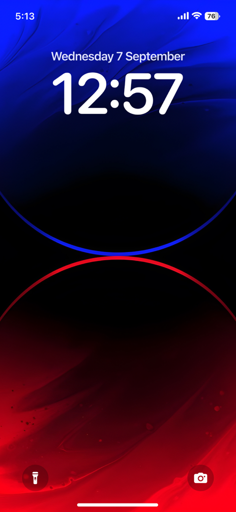 4K Wallpaper - HD Wallpaper - iPhone lock screen featuring an abstract 4K wallpaper with blue and red liquid circles on a dark background