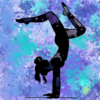 a woman doing a handstand