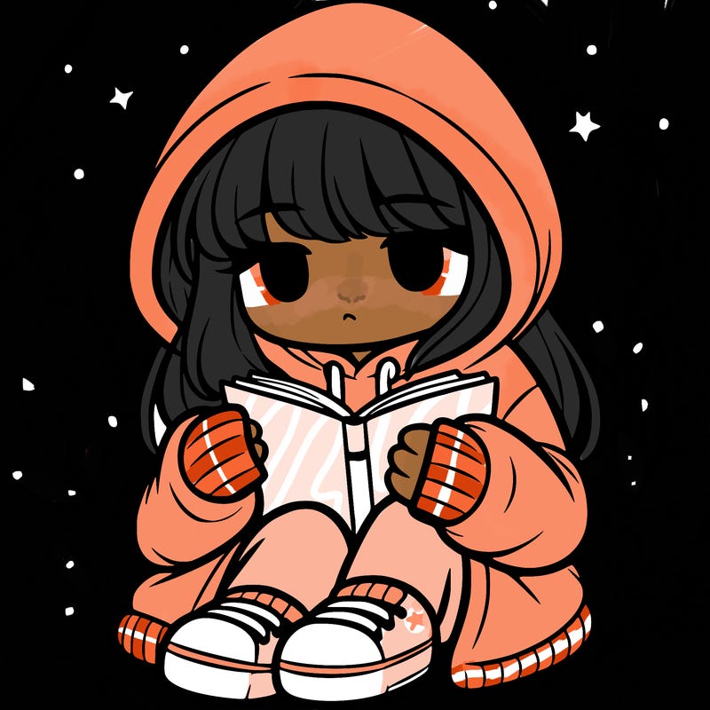 girl in oversized hoodie reading a book