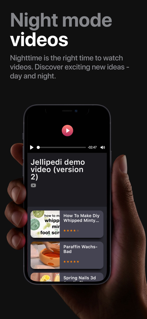 Nail Art Salon-Stylish Designs - A person holding a phone showing the Nail Art Salon app in night mode with a list of DIY beauty video tutorials