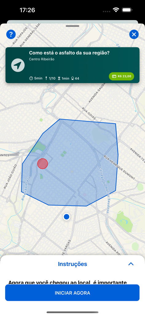 Visualização de mapa no aplicativo PiniOn mostrando uma área de missão destacada em uma cidade com um botão para iniciar a tarefa.