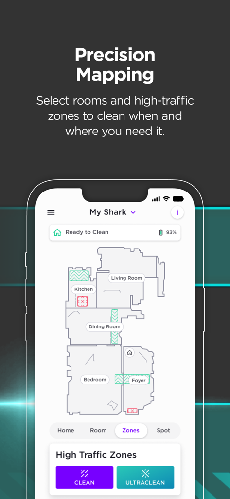 Schermata dello smartphone che mostra l'interfaccia dell'app SharkClean con una mappa della pianta della casa e zone di pulizia ad alto traffico