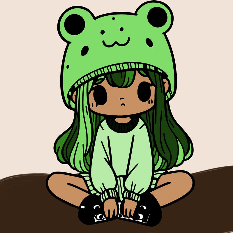 a girl wearing a frog hat and some frog socks