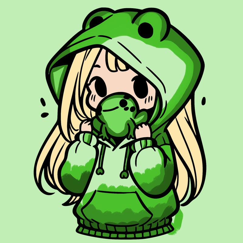 a girl holding a froggy hoodie