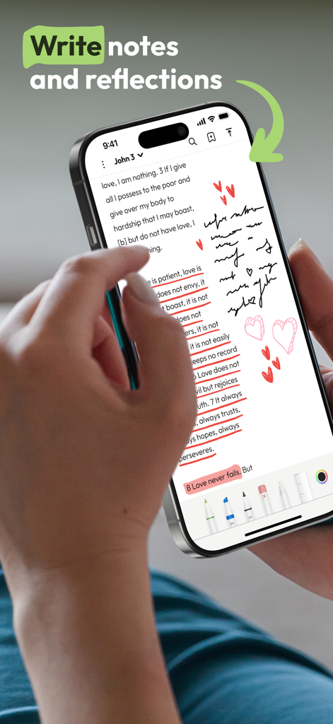 Pencil Bible: Bible Notes App - A person using the Pencil Bible app on an iPhone to add handwritten notes and heart drawings to a Bible passage.