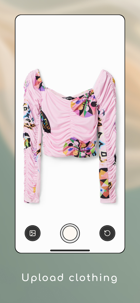 Uwear: Try On Anywhere - Mobile app interface showing a pink patterned long-sleeve top being uploaded for virtual try-on